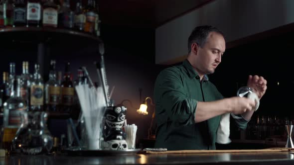 Bartender Is Cleaning Up The Glass