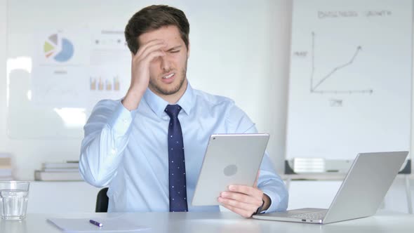 Young Businessman Upset by Business Loss alt