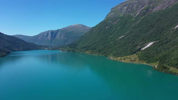 Lake Oldevatn Norway - Huge crispy clean glacial green freshwater lake in Olden Norway - Forwarding alt