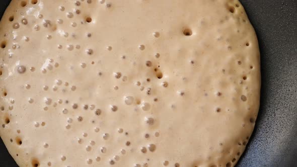 Cooking Home Made Pancake on Frying Pan alt