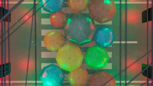 Countless people crossing the street protected by colourful umbrellas. 4KHD alt