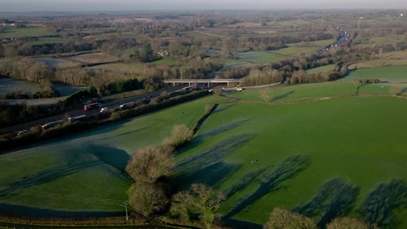 M40 Motorway Train Railway Aerial Landscape Rowington Warwickshire UK Winter Transportation Travel
