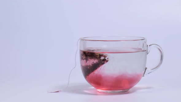 Timelapse Infusion of Fruit Tea in a Transparent Cup