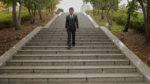 Japanese businessman in Tokyo alt