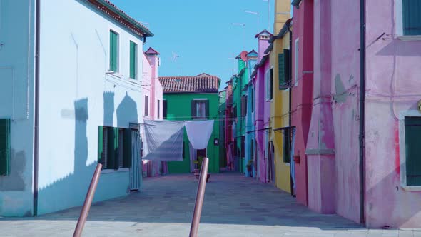 Burano Yard and Clothes Drying on Clothesline Between Houses alt