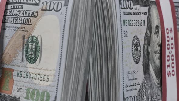 Bundles of Dollars Rotate on Blue Background Heap of Money