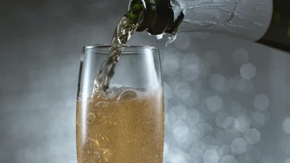 Pouring champagne in super slow motion.  Shot on Phantom Flex 4K high speed camera.