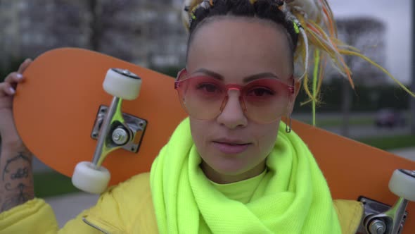 Portrait of a Modern Creative Woman with Colored Hair alt