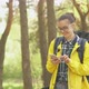 Young female tourist search position navigation on smart phone to find right way