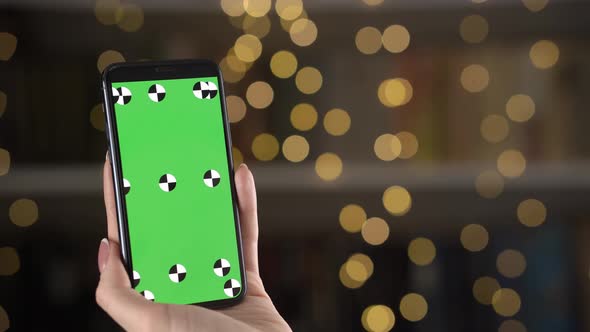 Closeup View of Mobile with Tracking Markers and Woman Hands Who Zoom the Content alt