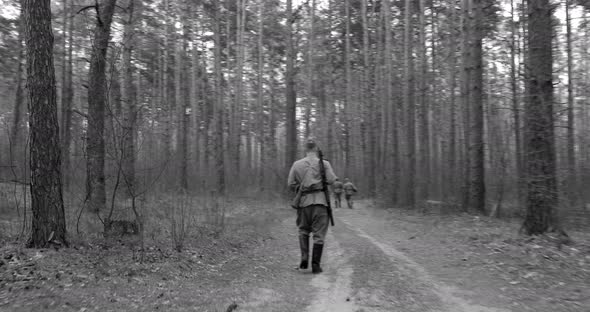 Reenactors Dressed As Russian Soviet Infantry Red Army Soldiers Of World War II Marching Walking alt