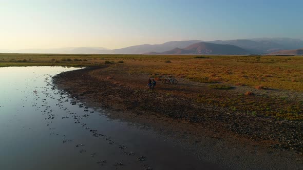 Reading a Book in a Wonderful Nature alt