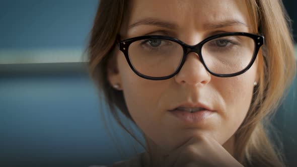 Young Beautiful Girl Face With Glasses Close Up