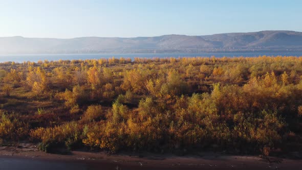 Aerial view of the Zhiguli mountains and the islands of the Volga river in the autumn season.