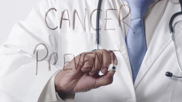 Asian Doctor Writing Cancer Prevention