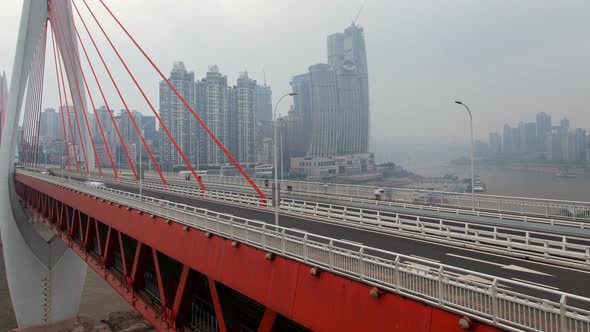 Chongqing City River Cityscape with Bridges Aerial China Timelapse Pan Up alt