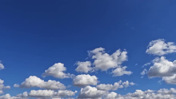 Blue Sky Floating Clouds