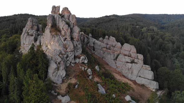 Aerial Drone Footage Flying Near Rocks of Famous Tustan Fortress alt