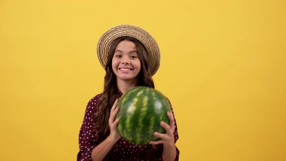 Happy Child in Straw Hat Hold Water Melon on Yellow Background Watermelon