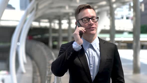 Real Estate Agent With Smartphone