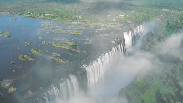 Aerial view od Victoria Falls with rainbow, between Zambia and Zimbabwe in Southern Africa.