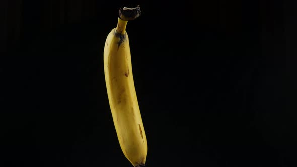 Close up fresh ripe banana rotate, Backgrounds textures.