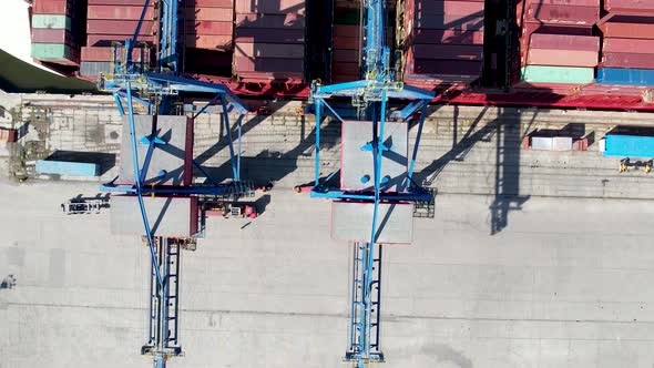 Container ship loading and unloading in port, alt