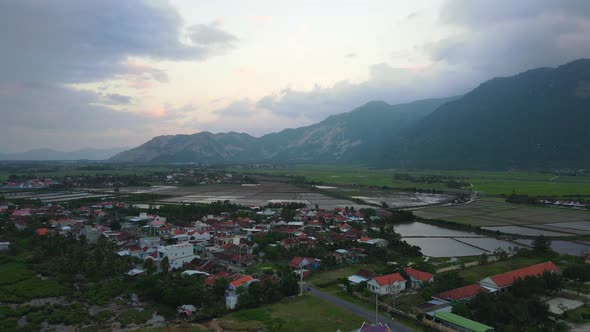 Epic Aerial View Of Tuy Hòa With Mountains And Shrimp Farms. alt