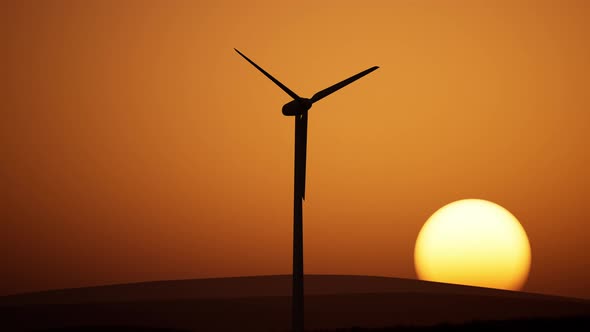 Wind Turbine At Sunset