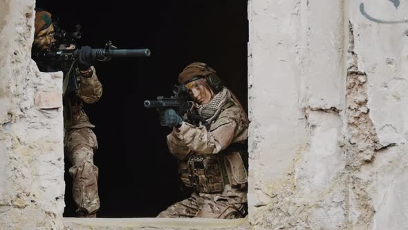 Female Airsoft Gun Players During the ASG Match alt