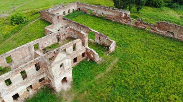 Flying over old ancient ruins cactle building