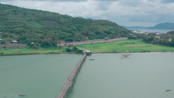 Aerial view of Ong Cop Bamboo Bridge in Song Cau, Phu Yen province ...