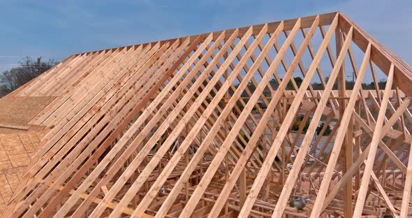 An Aerial View of an Unfinished House with a Wooden Beam House Construction Process alt