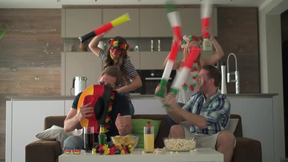 German and Italian soccer Fans at Home alt