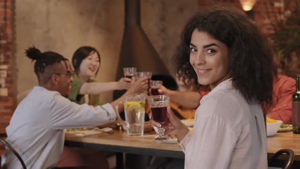 Mixed-race Brunette Dining with Friends alt
