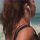 Woman in Earphones is Running Along Seashore - VideoHive Item for Sale