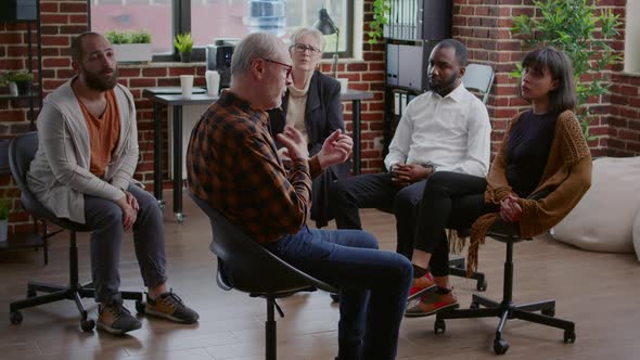 Old Person Complaining About Alcohol Addiction with People and Therapist at Aa Meeting alt