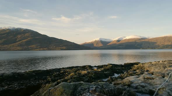 Slow Flight Over the Shores of a Scottish Loch alt