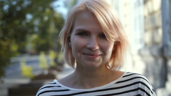 Portrait of Happy Cheerful Smiling Young Beautiful Blond Woman alt