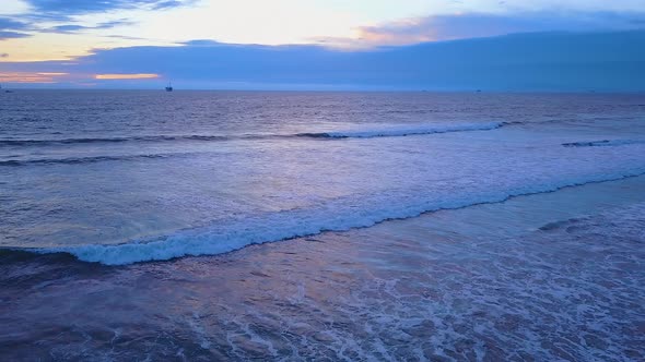 Drone footage of 2 oil platforms out in the ocean. Footage was captured, at sunset, in Huntington Be alt
