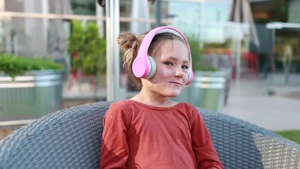 Girl Enjoys Headphones