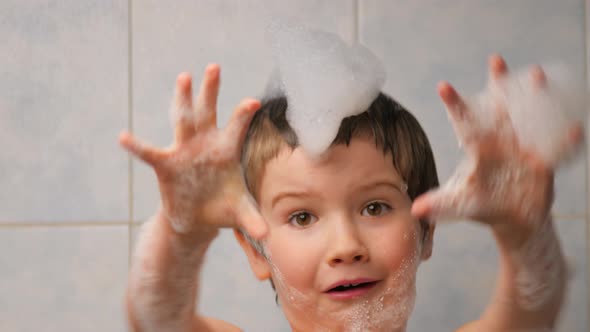 Foam on Head Boy Making Funny Face Close Up Child Taking Bath Children Portrait Smiling Kid Water