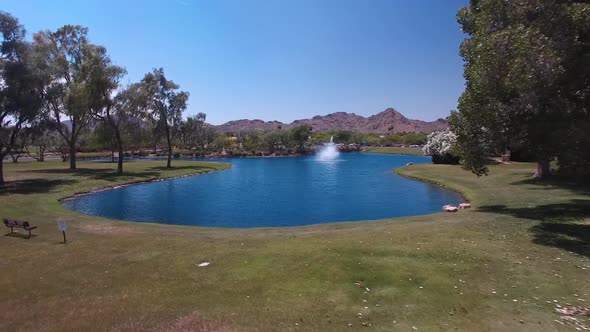 Aerial drone footage of fountain at the entrance of McCormick Ranch alt