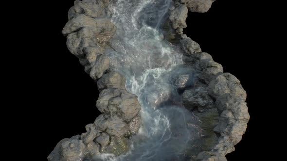 Water Flows Down From The Stone Surface Of The Waterfall In Miniature On A Black Background