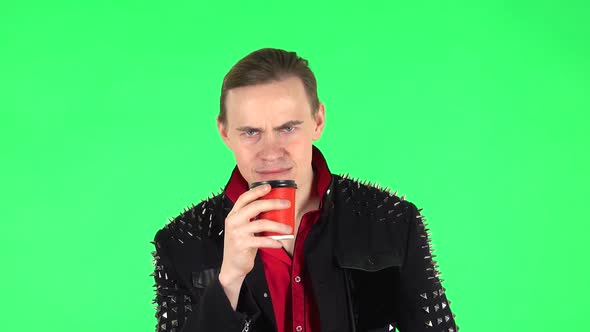 Guy Drinks Unpalatable Coffee and Is Disgusted on Green Screen alt