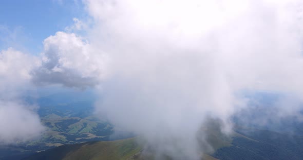 White Clouds Thicken Over The Mountains