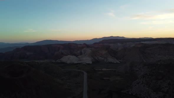 Sunset over rocks and mountains in Snow Canyon State Park, Utah. Aerial landscape view alt