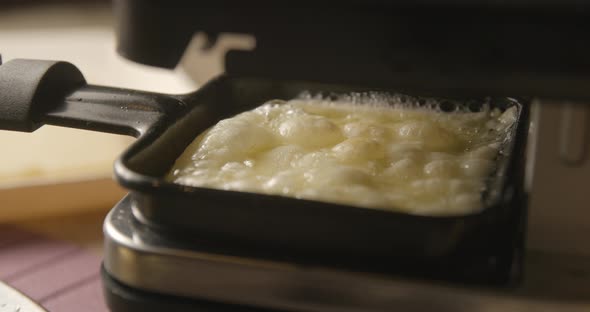 Raclette swiss and french meal, 4K slow motion