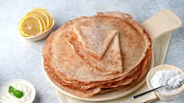 Pancakes with lemon and sugar,traditional fod Shrove Tuesday. English pancake day holiday alt