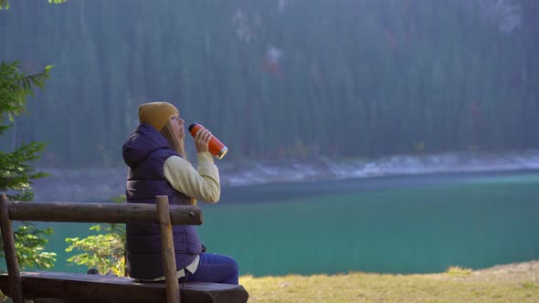 A Young Woman Visits the Crno Jezero or the Black Lake Near the City of Zabljak alt